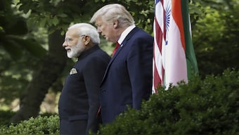 President Donald Trump with Prime Minister Narendra Modi at the White House. The 25 per cent tariff and Russian penalty on India comes even as officials continue to hammer out a trade deal, which has been ongoing since February. File image/AP