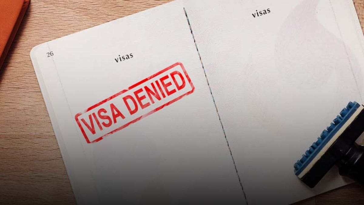 Why were 10 Indians denied entry into Malaysia despite the visa-free provision?