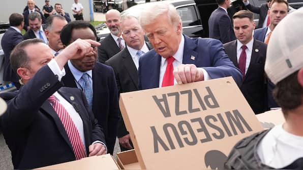 Pizza with a topping of praise: Inside Trump’s visit to National Guard troops in Washington