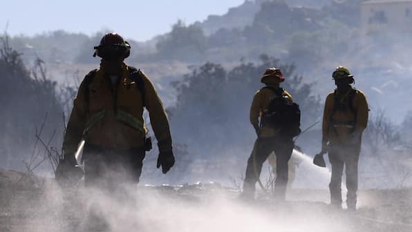Smoke and silence: US firefighters risk cancer, lung diseases while Trump dismisses climate change risks