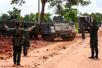 Armoured personnel carriers are seen on a road near Thailand-Cambodia's border in Sisaket province, the day after the leaders of Cambodia and Thailand agreed to a ceasefire in a bid to bring an end to their deadliest conflict in more than a decade and ahead of military negotiations. File image/ Reuters
