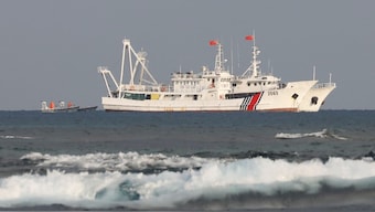China Coast Guard vessels are pictured at the disputed Scarborough Shoal. File image/ Reuters