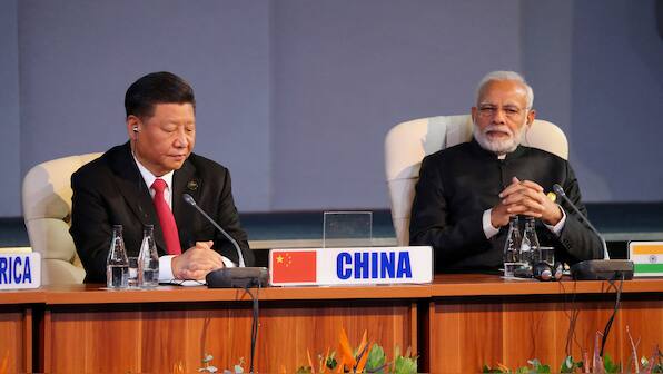 India and China must work together to stabilise world economy, says PM Modi amid tariff tensions with US