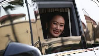 Thailand's Paetongtarn Shinawatra, who was dismissed as prime minister, looks out of a vehicle as she leaves the Government House, after the Constitutional Court ruled to remove her from office in a high-profile ethics case, following a leaked phone conversation between her and Cambodia's former leader Hun Sen, in Bangkok, Thailand. Reuters