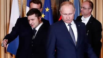 In Paris in 2019, the two men sat down together as part of what was known as the Normandy Format talks. AFP/File Photo
