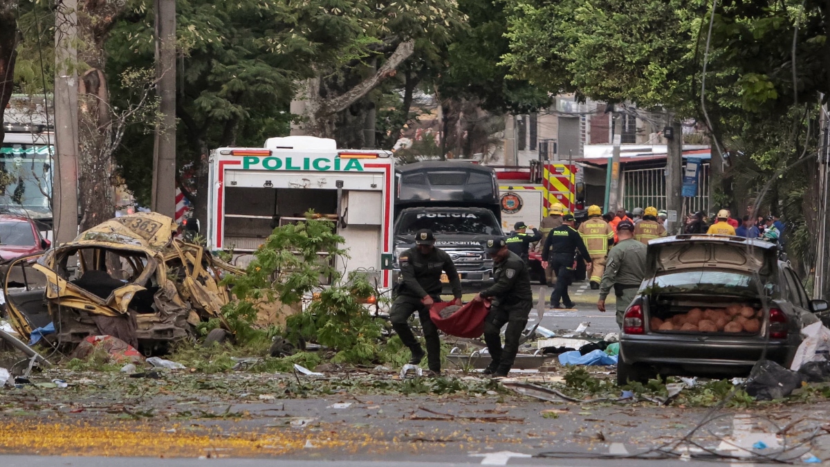 Police officers carry debris from the site of a bomb explosion in cali, Colombia on August 21 2025. AFP Police officers carry debris from the site of a bomb explosion in cali, Colombia on August 21 2025. AFP