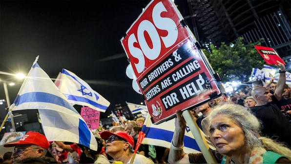 ‘Why aren't you on our side?’ Freed Israeli hostages seek answers as Gaza war rages on