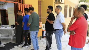 People line up to vote during municipal elections in Tripoli, Libya, Saturday, Aug. 16, 2025. (AP Photo/Yousef Murad)