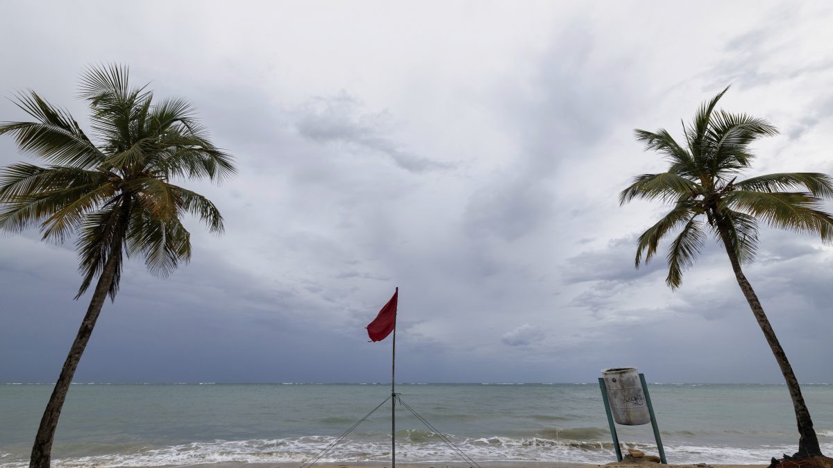 A red flag warns of dangerous waves on an empty beach in San Juan, Puerto Rico, after Hurricane Erin passed by near the island. AP A red flag warns of dangerous waves on an empty beach in San Juan, Puerto Rico, after Hurricane Erin passed by near the island. AP