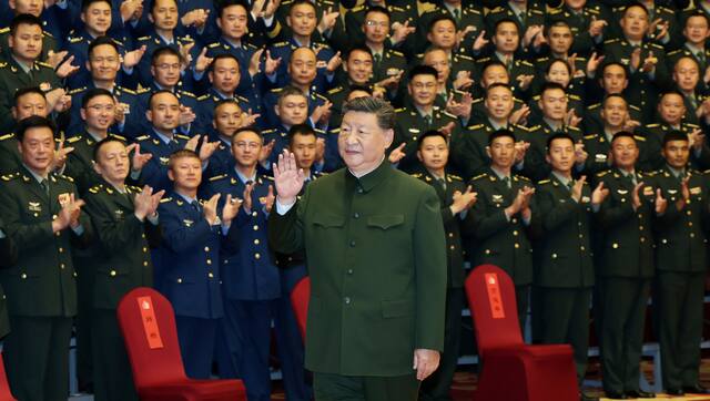 In this photo released by Xinhua News Agency, Chinese President Xi Jinping meets with representatives of military personnel stationed in Lhasa. AP