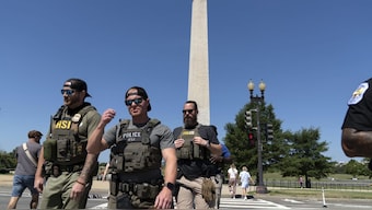 Homeland Security Investigations (HSI) agents patrol the National Mall, Saturday, Aug. 23, 2025, in Washington. AP