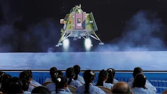 People watch a live stream of Chandrayaan-3 spacecraft's landing on the moon, inside an auditorium of Gujarat Science City in Ahmedabad, India, August 23, 2023. File Image/Reuters