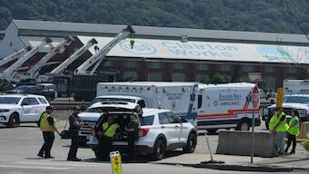 Emergency crew gather after an explosion at the Clairton Coke Works, a US Steel coking plant, on Monday in Clairton, Penn. AP