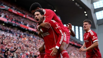 Hungarian midfielder Dominik Szoboszlai celebrates with his Liverpool teammates after scoring the only goal of their Premier League game against Arsenal at Anfield. Reuters