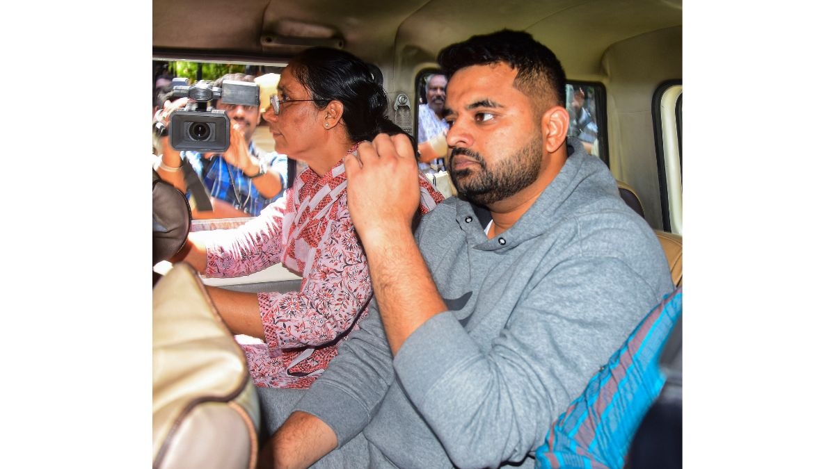 Suspended JD (S) MP Prajwal Revanna, facing allegations of sexually abusing several women, being taken to a hospital for medical examination under tight security, in Bengaluru, Karnataka, on Friday, May 31, 2024. (Photo: PTI) Suspended JD (S) MP Prajwal Revanna, facing allegations of sexually abusing several women, being taken to a hospital for medical examination under tight security, in Bengaluru, Karnataka, on Friday, May 31, 2024. (Photo: PTI)