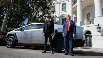 US President Donald Trump and Tesla-owner Elon Musk stand in front of a Tesla Cybertruck at the White House. (Photo: White House)