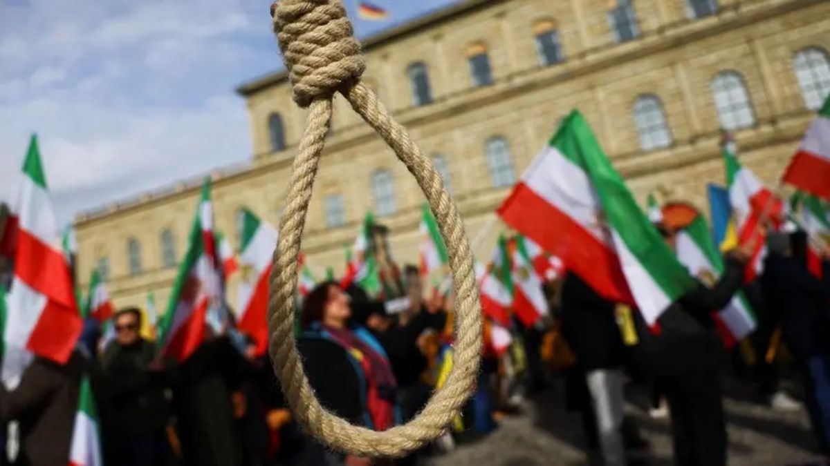 A noose is seen as people hold Iranian flags during a protest on the day of the Munich Security Conference, in Munich, Germany, February 17, 2023. (Representative Photo, Credit: Reuters) A noose is seen as people hold Iranian flags during a protest on the day of the Munich Security Conference, in Munich, Germany, February 17, 2023. (Representative Photo, Credit: Reuters)