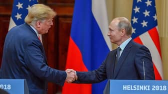 US President Donald Trump (left) and Russia's President Vladimir Putin shake hands before attending a joint press conference after a meeting at the Presidential Palace in Helsinki, on July 16, 2018. (Photo: Yuri Kadobnov/AFP)