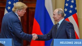 US President Donald Trump (left) and Russia's President Vladimir Putin shake hands before attending a joint press conference after a meeting at the Presidential Palace in Helsinki, on July 16, 2018. (Photo: Yuri Kadobnov/AFP)