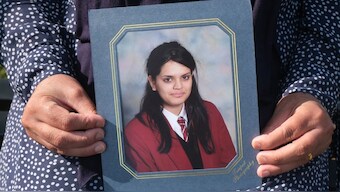 Yasmin Javed holds a photo of her daughter Fawziyah, who was killed by Fawziyah’s husband in an act of honour-based violence Edinburgh, Scotland. (Photo: Sam Tabahriti/Reuters)