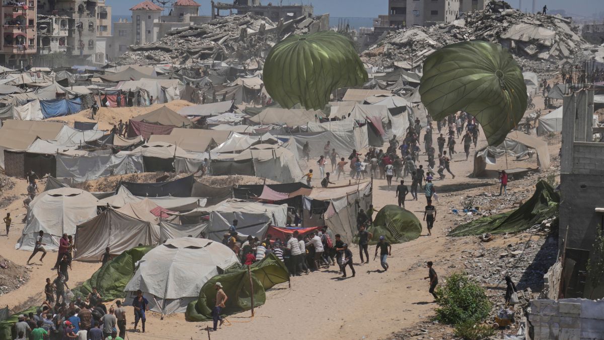Palestinians rush to collect humanitarian aid airdropped by parachutes into Gaza City, northern Gaza Strip, August 7, 2025. File Image/AP Palestinians rush to collect humanitarian aid airdropped by parachutes into Gaza City, northern Gaza Strip, August 7, 2025. File Image/AP