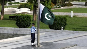 A member of the Pakistan Air Force (PAF) rehearses flag masting at the mausoleum of Muhammad Ali Jinnah before the Defence Day ceremonies, or Pakistan's Memorial Day, in Karachi, Pakistan. File Image/Reuters