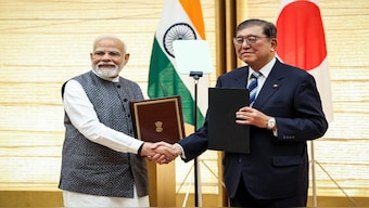 Prime Minister Narendra Modi and Japan's Prime Minister Shigeru Ishiba shake hands during a joint press conference in Tokyo, Japan on Friday. Reuters