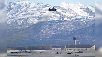 US Air Force F-22 Raptor fighters participate in a close formation taxi, known as an Elephant Walk during the two-week Polar Force exercise at Joint Base Elmendorf-Richardson, Alaska, US, March 26, 2019. File Image/US Air Force via Reuters