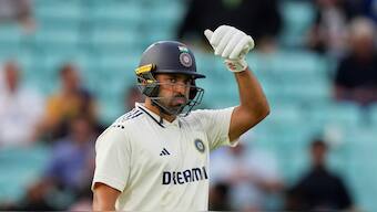 India's Karun Nair gestures after completing his half-century on Day 1 of the fifth Test against England at The Oval, London. AP
