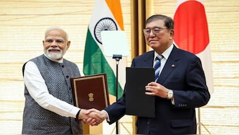 Prime Minister Narendra Modi and Japan's Prime Minister Shigeru Ishiba shake hands during a joint press conference in Tokyo, Japan August 29, 2025. Image: Takashi Aoyama/Pool via Reuters