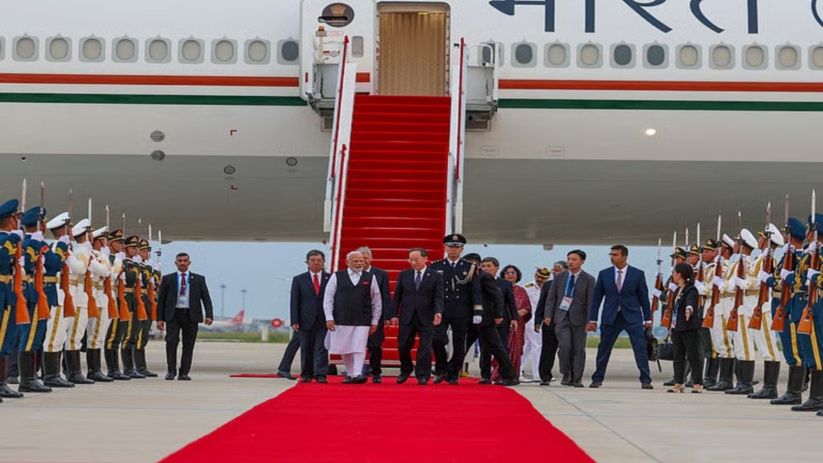 Prime Minister Narendra Modi being welcomed upon his arrival at the airport, in Tianjin, China, on Saturday. Image: PTI Prime Minister Narendra Modi being welcomed upon his arrival at the airport, in Tianjin, China, on Saturday. Image: PTI