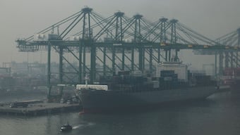 Cargo ships are docked at APM Terminals on a smoggy day in Navi Mumbai, India, February 28, 2025. File Image/Reuters