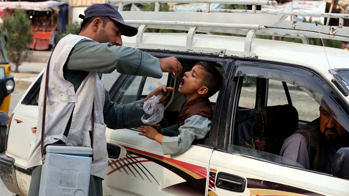 A health worker administers a polio vaccine to a child in Jalalabad, Afghanistan, October 29, 2024. File Image/AP A health worker administers a polio vaccine to a child in Jalalabad, Afghanistan, October 29, 2024. File Image/AP