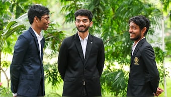 R Praggnanandhaa with fellow Chennai chess players D Gukesh and Aravindh Chidambaram. Image: PTI