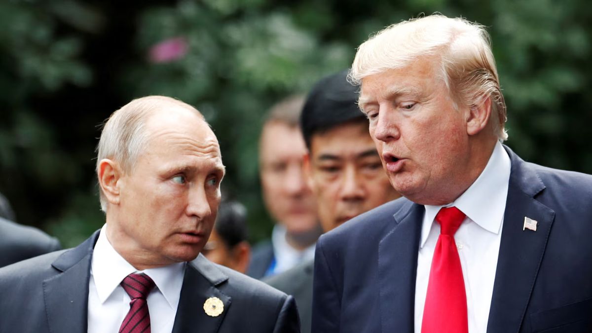U.S. President Donald Trump and Russia's President Vladimir Putin talk during the family photo session at the APEC Summit in Danang, Vietnam November 11, 2017. Image- Reuters U.S. President Donald Trump and Russia's President Vladimir Putin talk during the family photo session at the APEC Summit in Danang, Vietnam November 11, 2017. Image- Reuters