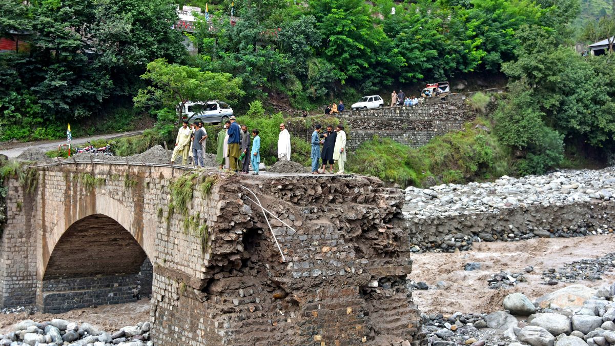 Onlookers gather near a destroyed bridge after flash floods on the outskirts of Muzaffarabad, the capital of Pakistan-administered Kashmir, on August 15, 2025. Image- AFP Onlookers gather near a destroyed bridge after flash floods on the outskirts of Muzaffarabad, the capital of Pakistan-administered Kashmir, on August 15, 2025. Image- AFP