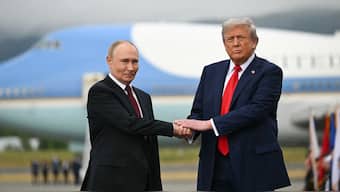 US President Donald Trump shakes hands with Russian President Vladimir Putin on the tarmac after they arrived at Joint Base Elmendorf-Richardson in Anchorage, Alaska, on August 15, 2025.- AFP