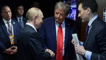 In this pool photograph distributed by the Russian state agency Sputnik, US President Donald Trump (C) and Russian President Vladimir Putin (L) shake hands after delivering a joint press conference following a US-Russia summit on Ukraine at Joint Base Elmendorf-Richardson in Anchorage, Alaska, on August 15, 2025. Image- AFP