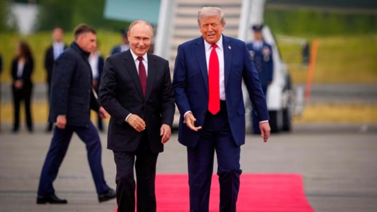 US President Donald Trump greets Russian President Vladimir Putin as he arrives at Joint Base Elmendorf-Richardson. AFP
US President Donald Trump greets Russian President Vladimir Putin as he arrives at Joint Base Elmendorf-Richardson. AFP