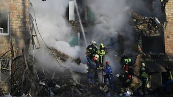 Ukrainian rescuers conduct a search and rescue operation in and around a residential building heavily damaged during a large-scale Russian drone and missile attack on Kyiv that killed at least 10 people on August 28, 2025, amid the Russian invasion of Ukraine. Image- AFP