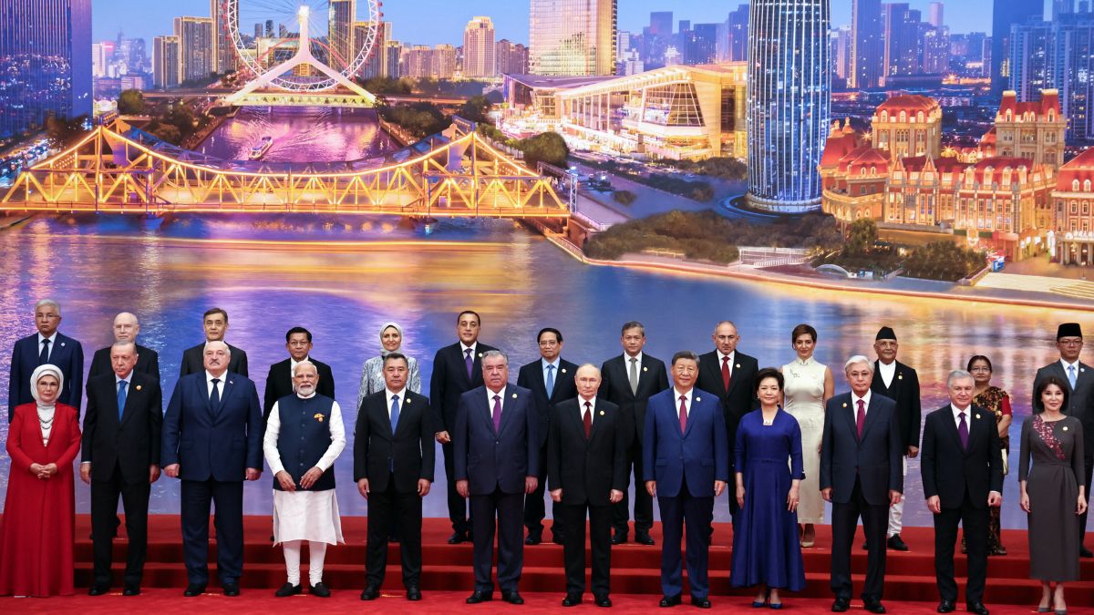 In this pool photograph distributed by the Russian state agency Sputnik, Russia's President Vladimir Putin, Chinese President Xi Jinping, his wife Peng Liyuan and foreign leaders pose during a family photo of the Shanghai Cooperation Organization (SCO) Summit in Tianjin on August 31, 2025. - AFP In this pool photograph distributed by the Russian state agency Sputnik, Russia's President Vladimir Putin, Chinese President Xi Jinping, his wife Peng Liyuan and foreign leaders pose during a family photo of the Shanghai Cooperation Organization (SCO) Summit in Tianjin on August 31, 2025. - AFP