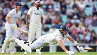 England's Josh Tongue dives on the ground during the second day of the fifth cricket test match between England and India at The Oval. AP 