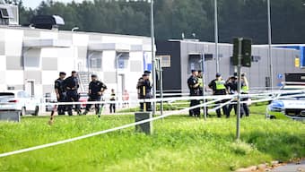 Police officers work at the scene outside a mosque after a shooting, in Orebro, Sweden on Friday. Reuters