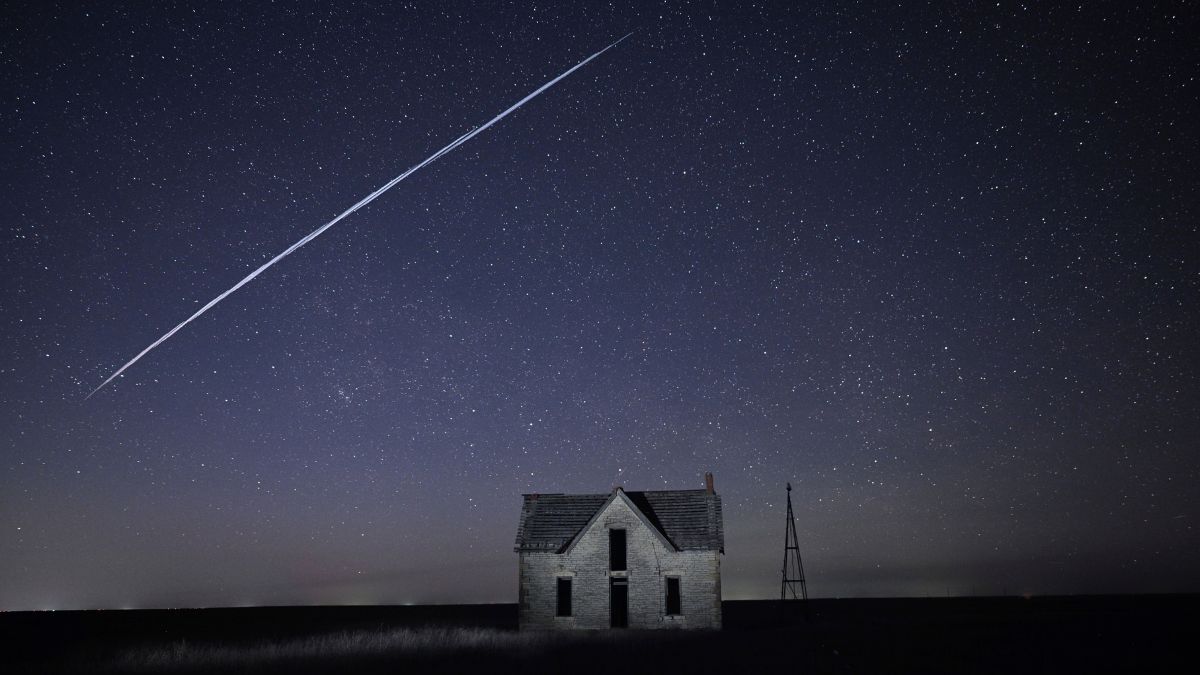 In this long exposure photo, a string of SpaceX StarLink satellites passes over an old stone house near Florence, Kansas. AP In this long exposure photo, a string of SpaceX StarLink satellites passes over an old stone house near Florence, Kansas. AP