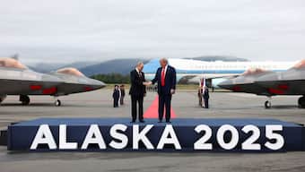 US President Donald Trump goes to shake hands with Russian President Vladimir Putin, as they meet to negotiate for an end to the war in Ukraine, at Joint Base Elmendorf-Richardson in Anchorage, Alaska, US, August 15, 2025. Reuters