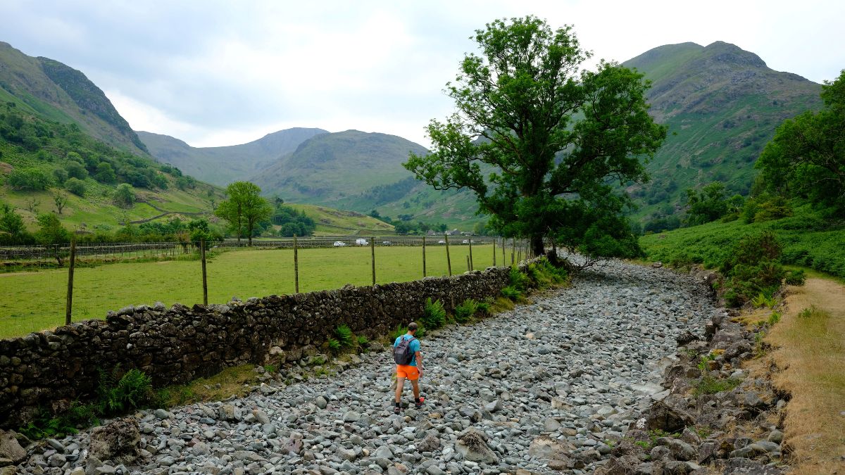 A man walks along the dry river bed of the River Derwent after a prolonged period of dry weather in Seathwaite, UK, June 18, 2023. File Image/Reuters A man walks along the dry river bed of the River Derwent after a prolonged period of dry weather in Seathwaite, UK, June 18, 2023. File Image/Reuters