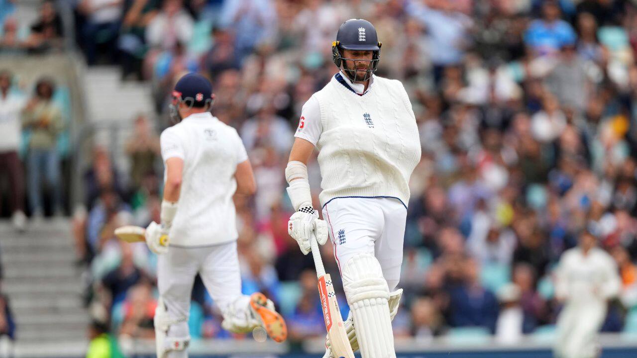 Chris Woakes batted with an injured shoulder.