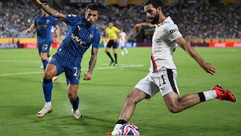 Al Hilal's Portuguese defender #20 Joao Cancelo and Manchester City's Algerian defender #21 Rayan Ait-Nouri fight for the ball during the FIFA Club World Cup 2025. AFP