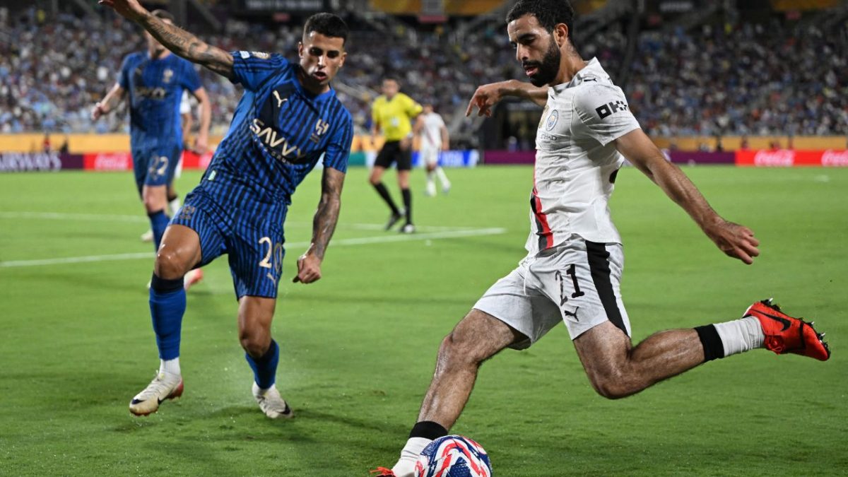 Al Hilal's Portuguese defender #20 Joao Cancelo and Manchester City's Algerian defender #21 Rayan Ait-Nouri fight for the ball during the FIFA Club World Cup 2025. AFP Al Hilal's Portuguese defender #20 Joao Cancelo and Manchester City's Algerian defender #21 Rayan Ait-Nouri fight for the ball during the FIFA Club World Cup 2025. AFP