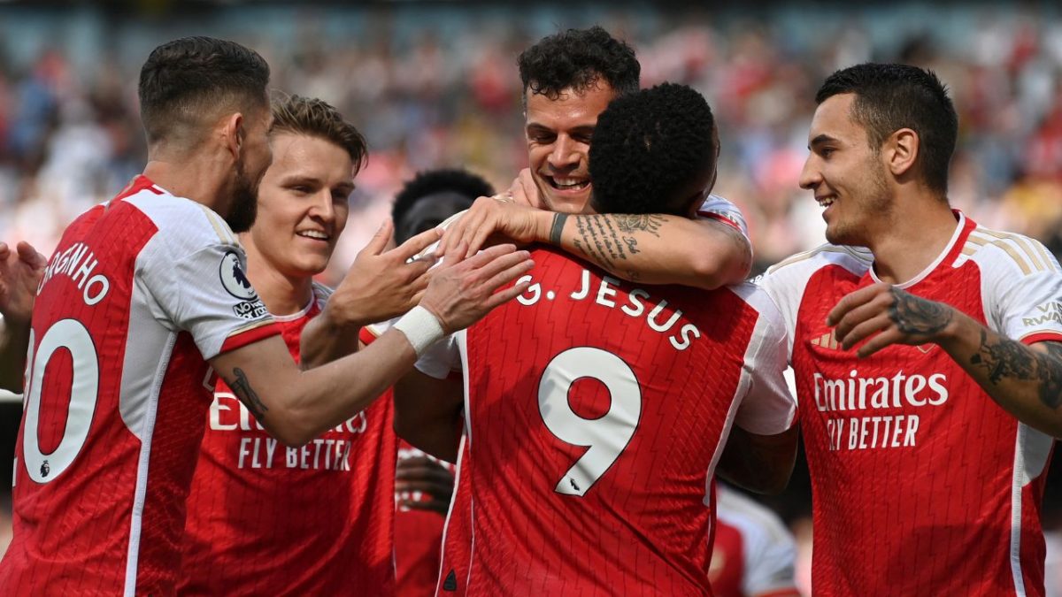 Arsenal players celebrate after scoring a goal. AFP Arsenal players celebrate after scoring a goal. AFP